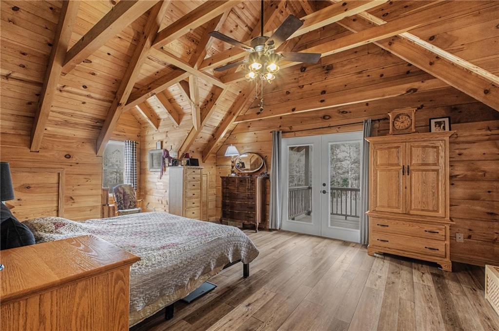 335 Bells Ferry Road Northeast Rome, GA 30161 - Photo 46 of 81 a spacious bedroom with a bed and a dresser