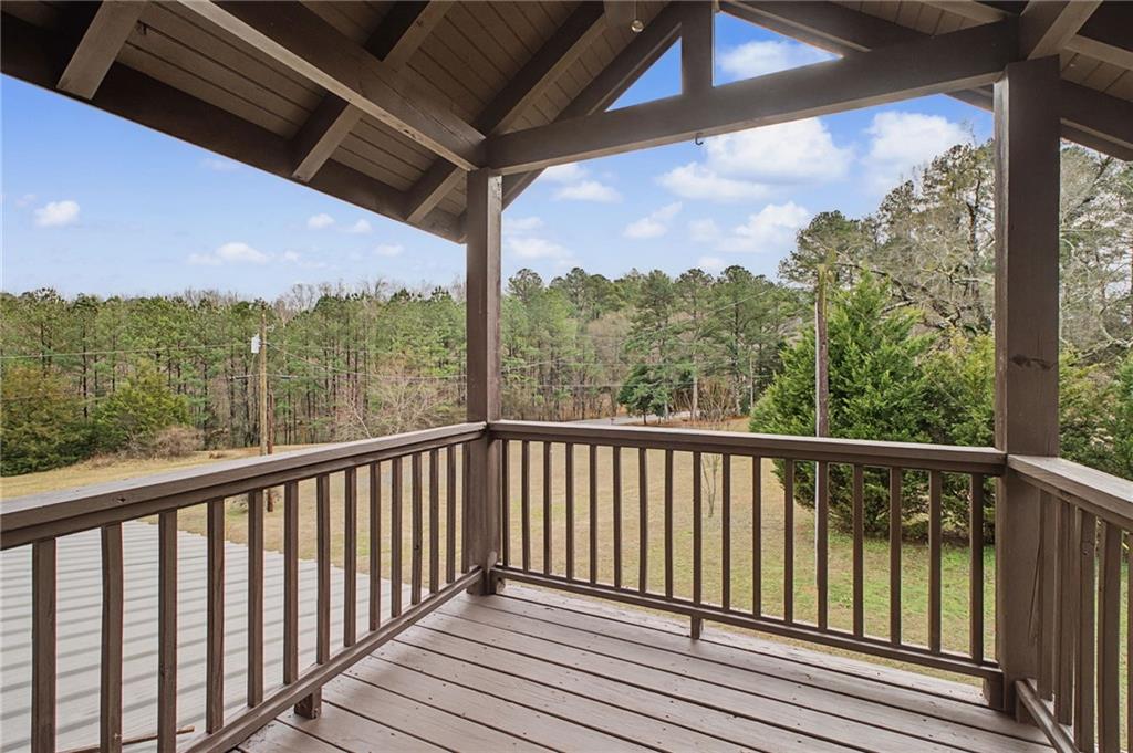 335 Bells Ferry Road Northeast Rome, GA 30161 - Photo 47 of 81 a view of a balcony with wooden floor