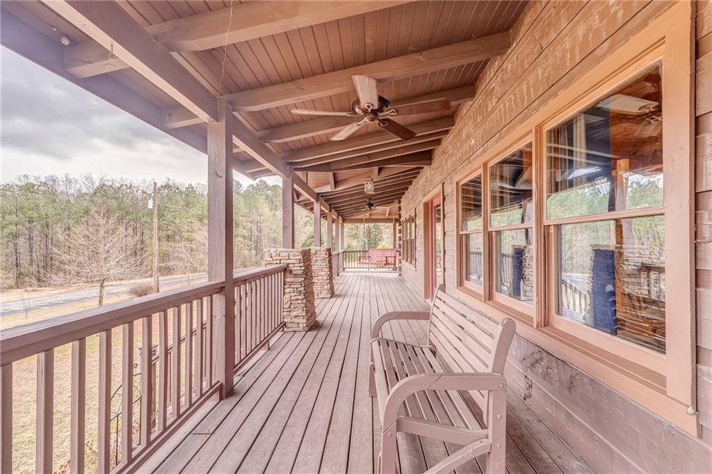 335 Bells Ferry Road Northeast Rome, GA 30161 - Photo 7 of 81 a view of a porch with wooden floor