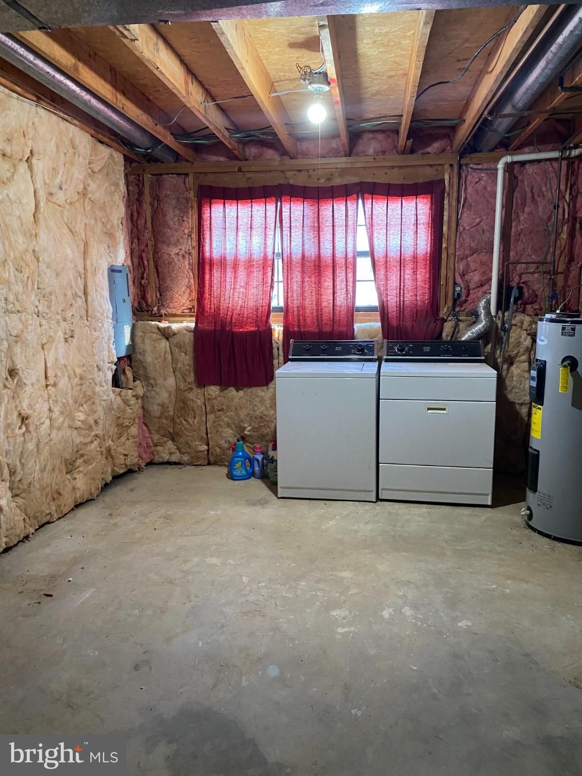 6621 Allentown Road Temple Hills, MD 20748 - Photo 20 of 23 Spacious laundry area with natural light.
