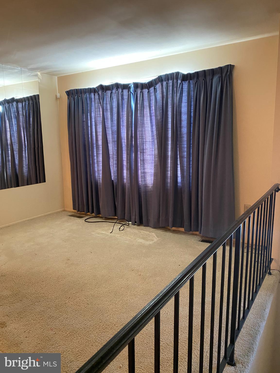6621 Allentown Road Temple Hills, MD 20748 - Photo 4 of 24 Spacious living room with natural light potential.