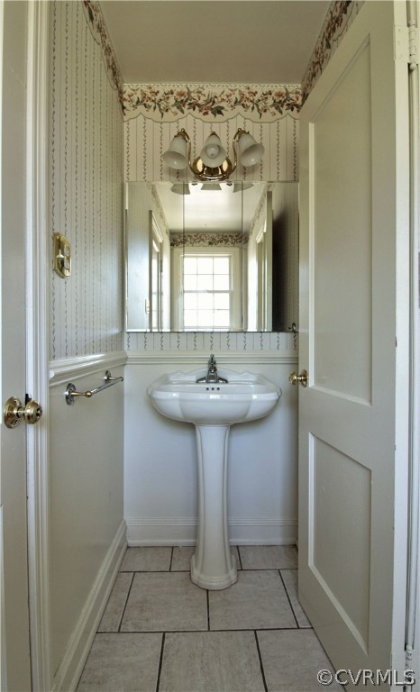 2931 Osborne Road Chester, VA 23831 - Photo 15 of 24 a bathroom with a sink a mirror and a shower