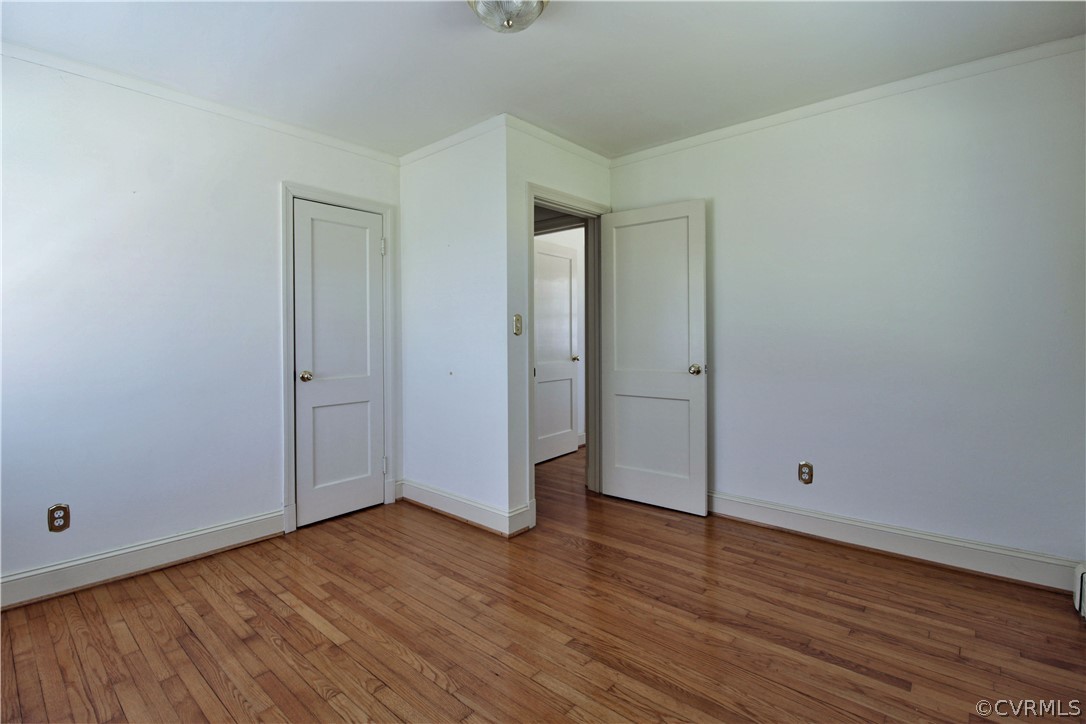 2931 Osborne Road Chester, VA 23831 - Photo 19 of 24 a view of an empty room with wooden floor