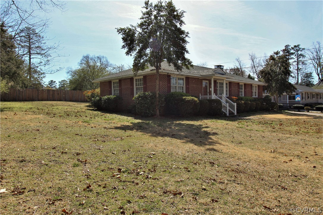 2931 Osborne Road Chester, VA 23831 - Photo 21 of 24 a front view of a house with a yard