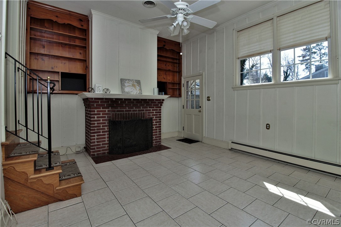 2931 Osborne Road Chester, VA 23831 - Photo 3 of 24 a view of an empty room with a fireplace and a window