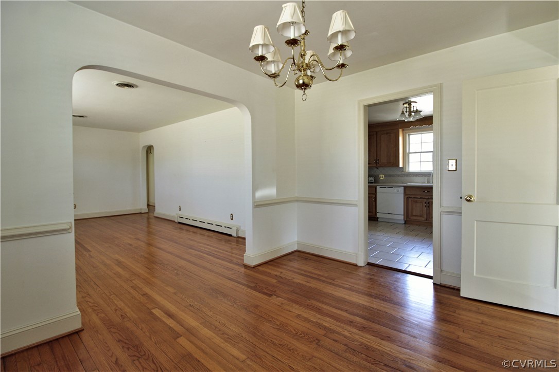 2931 Osborne Road Chester, VA 23831 - Photo 5 of 24 wooden floor in an empty room with a window