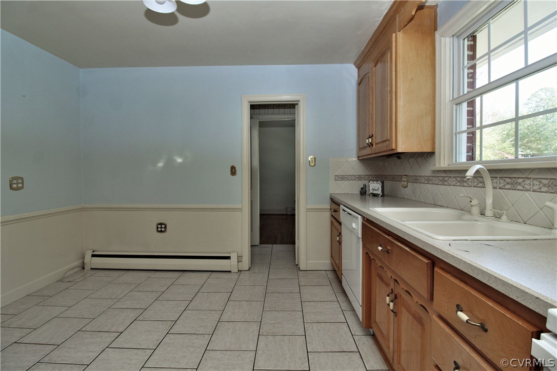 2931 Osborne Road Chester, VA 23831 - Photo 9 of 24 a kitchen with a sink cabinets and window
