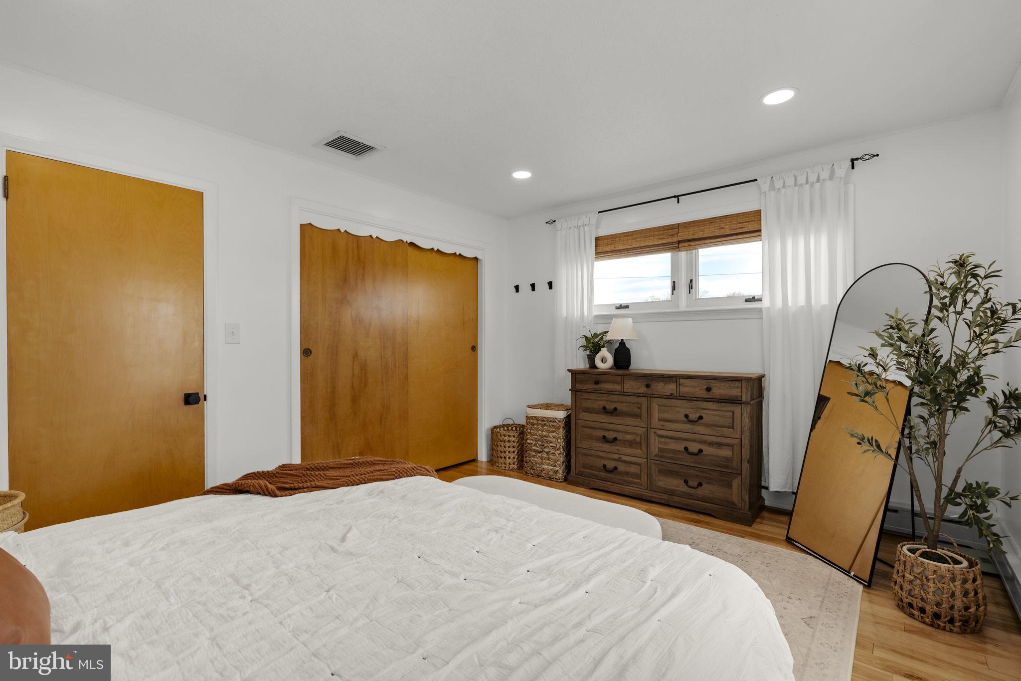 218 Lauschtown Road Denver, PA 17517 - Photo 34 of 78 a bedroom with a bed and a dresser