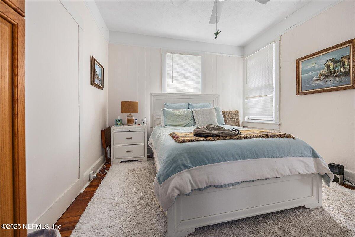 517 Beach Avenue Atlantic Beach, FL 32233 - Photo 22 of 25 a bedroom with a bed and a window