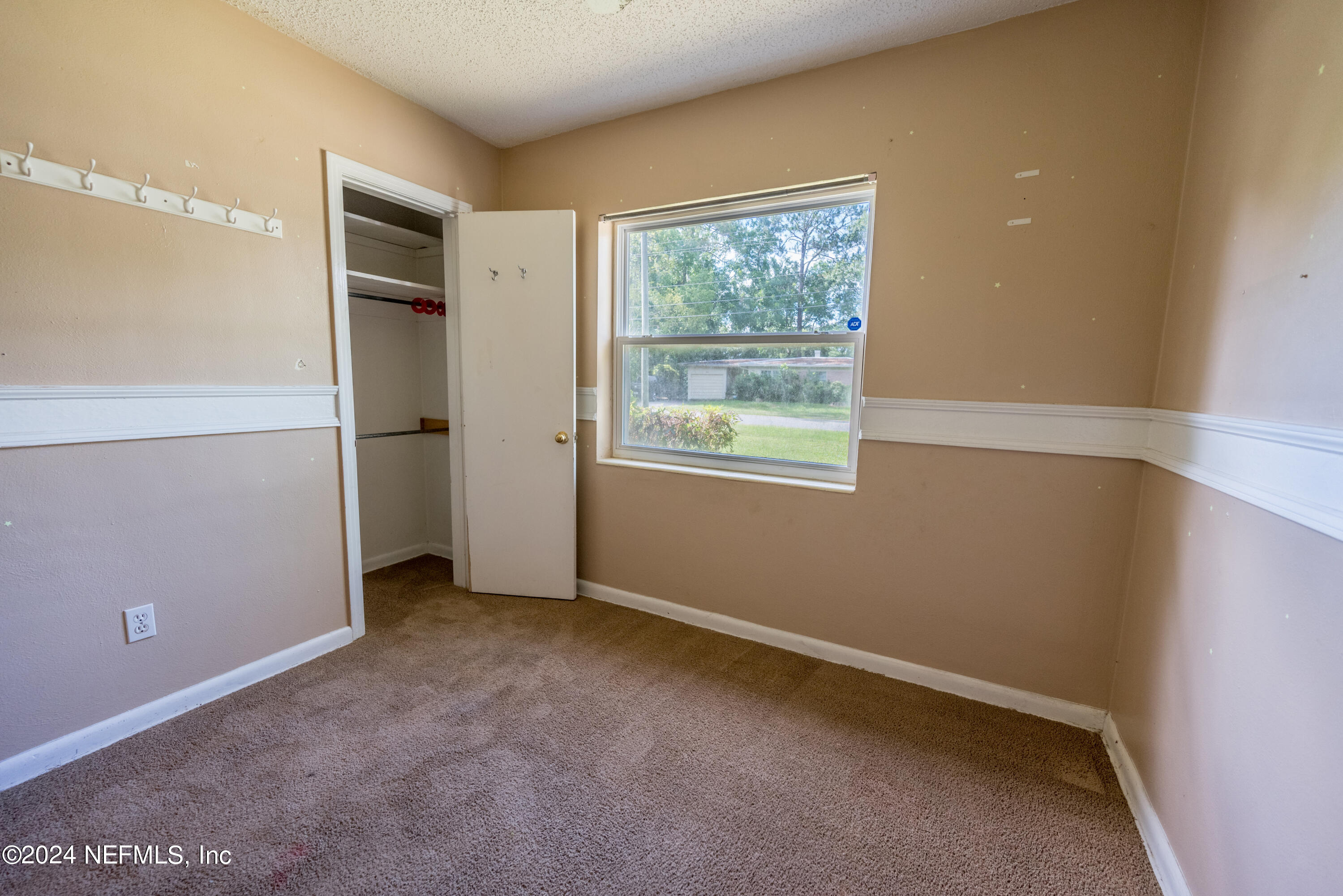 1122 West Pratt Street Starke, FL 32091 - Photo 13 of 22 an empty room with windows