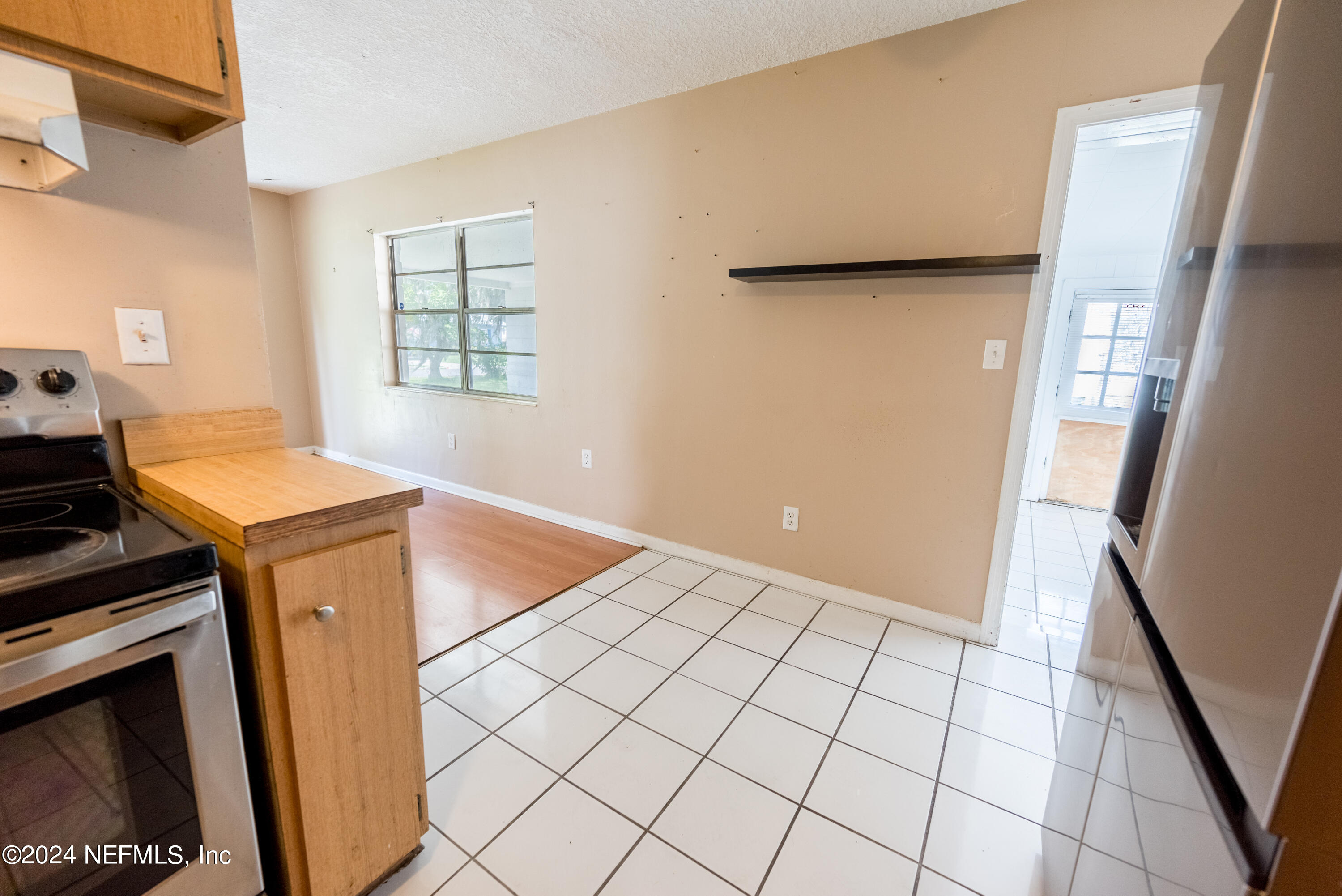1122 West Pratt Street Starke, FL 32091 - Photo 7 of 22 a view of a kitchen and utility room