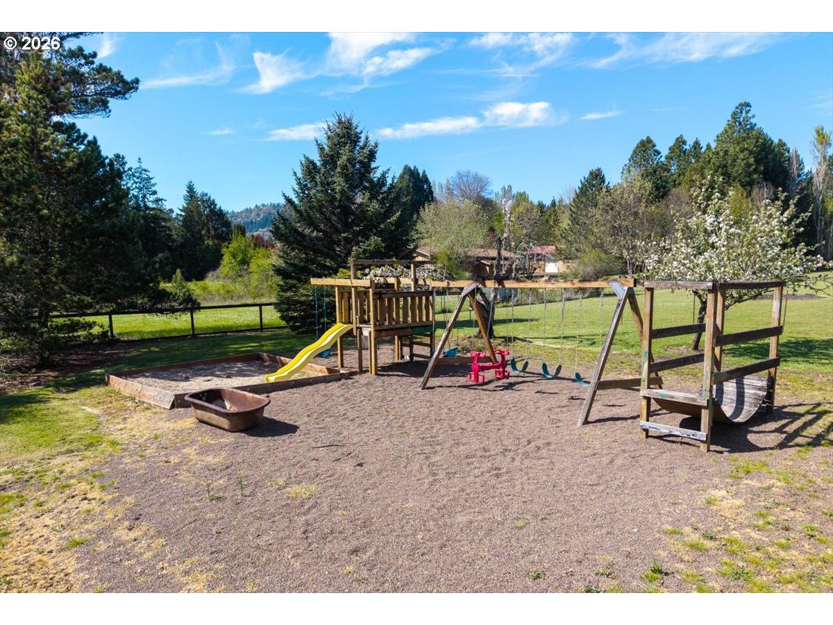 2035 Primrose Loop Philomath, OR 97370 - Photo 20 of 48 a view of outdoor space with playground and green space