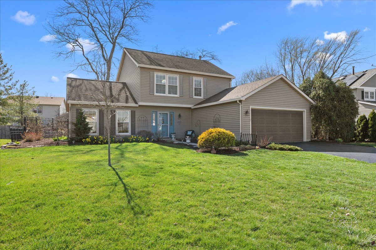 2138 Derby Court Wheaton, IL 60189 - Photo 1 of 24 a house that has sitting area in front of it