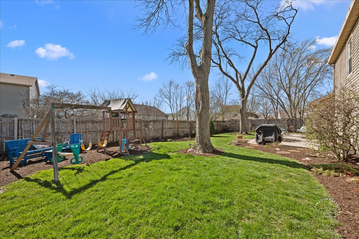 2138 Derby Court Wheaton, IL 60189 - Photo 22 of 24 a view of a backyard with sitting area