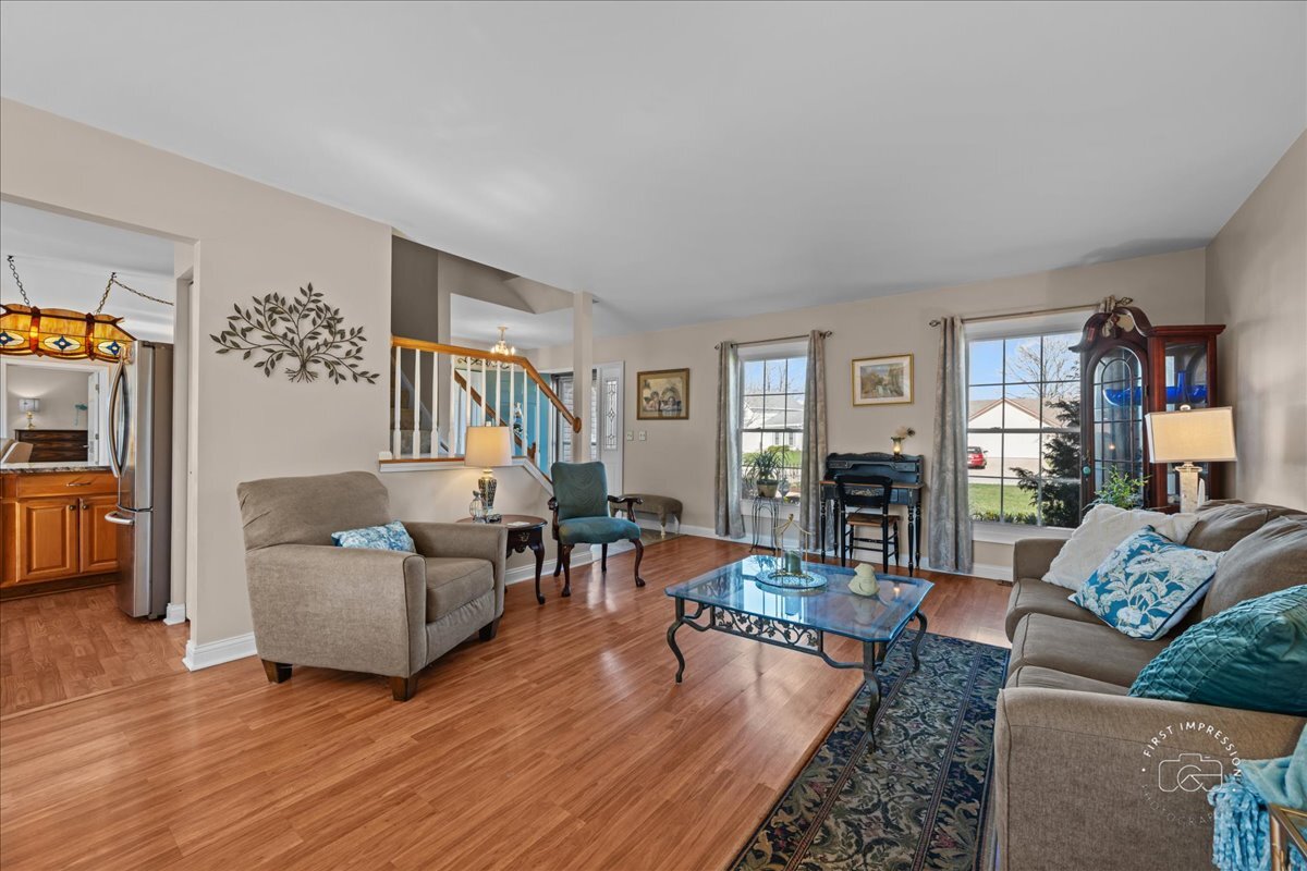 2138 Derby Court Wheaton, IL 60189 - Photo 4 of 24 a living room with furniture and wooden floor