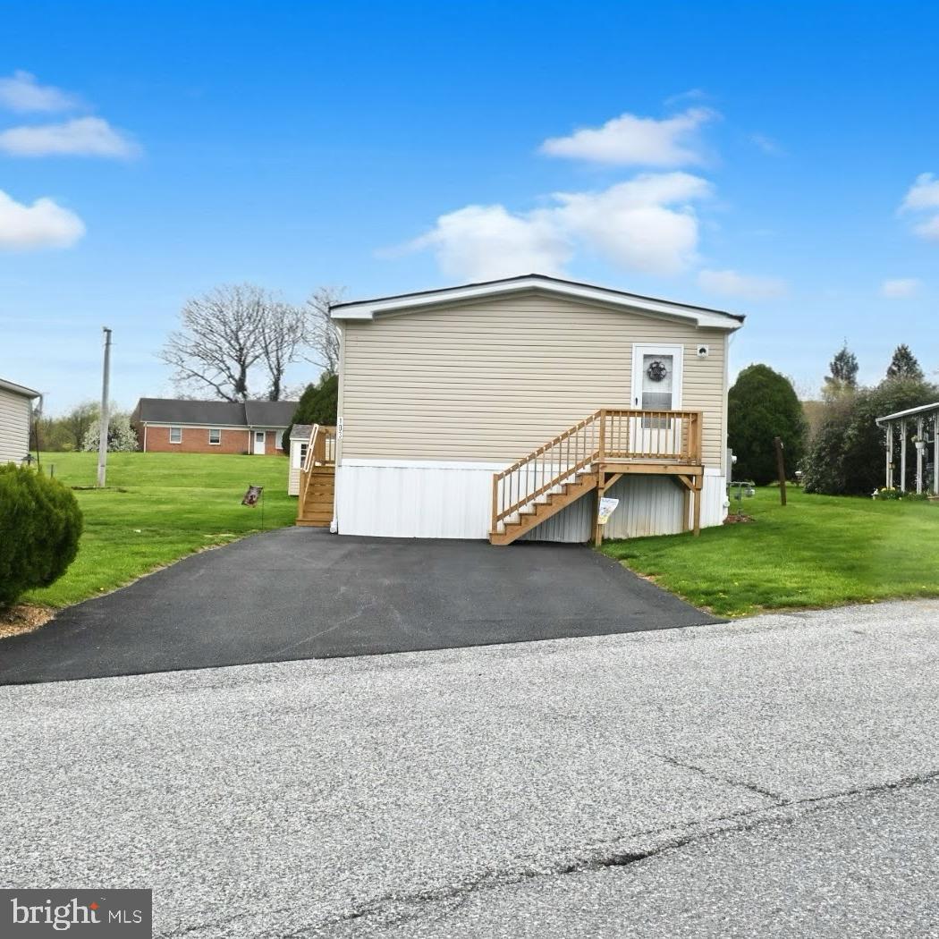 103 Carbridge Road East Stewartstown, PA 17363 - Photo 2 of 28 a view of a house with a yard