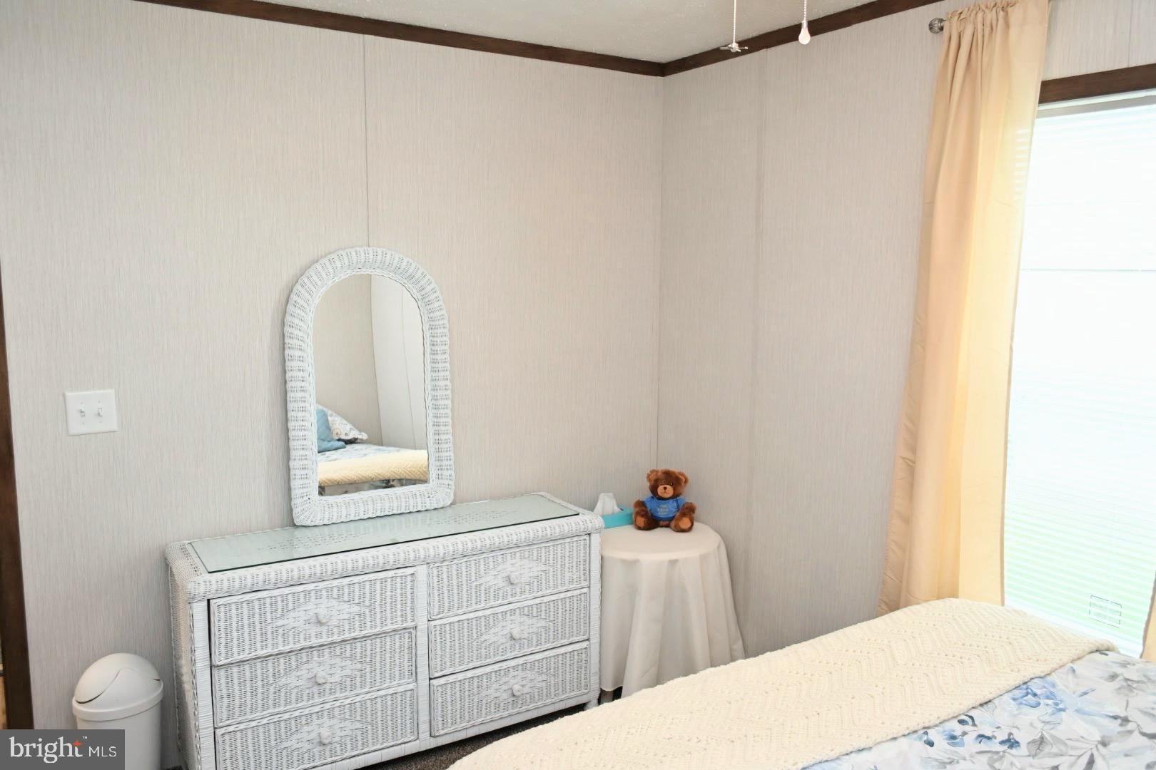 103 Carbridge Road East Stewartstown, PA 17363 - Photo 21 of 28 a bedroom with a bed and a dresser