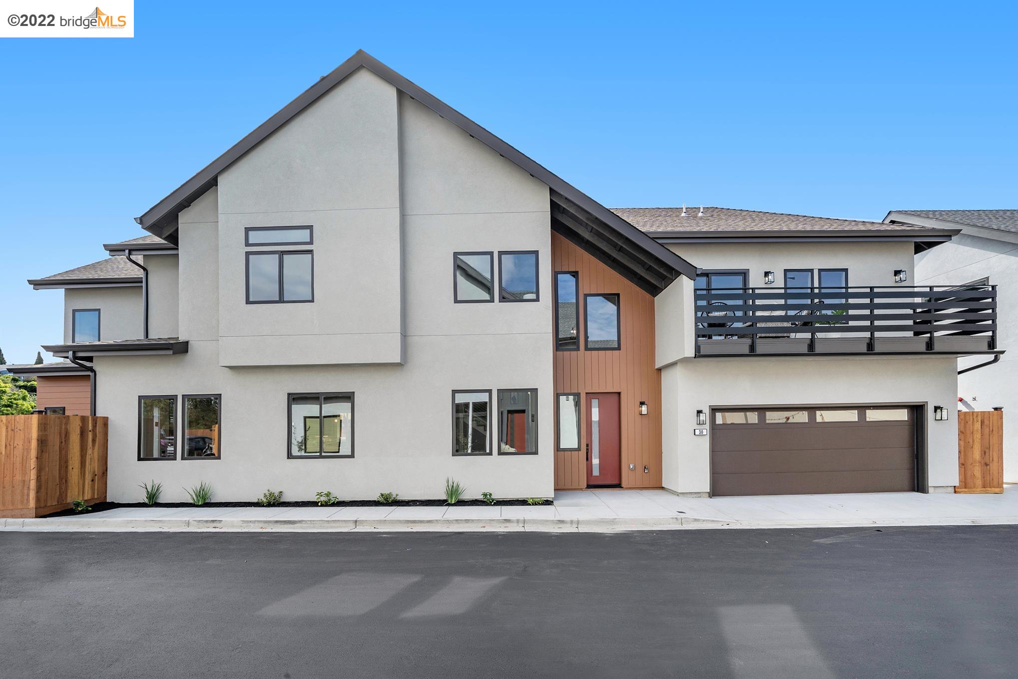 a front view of a house with a garage
