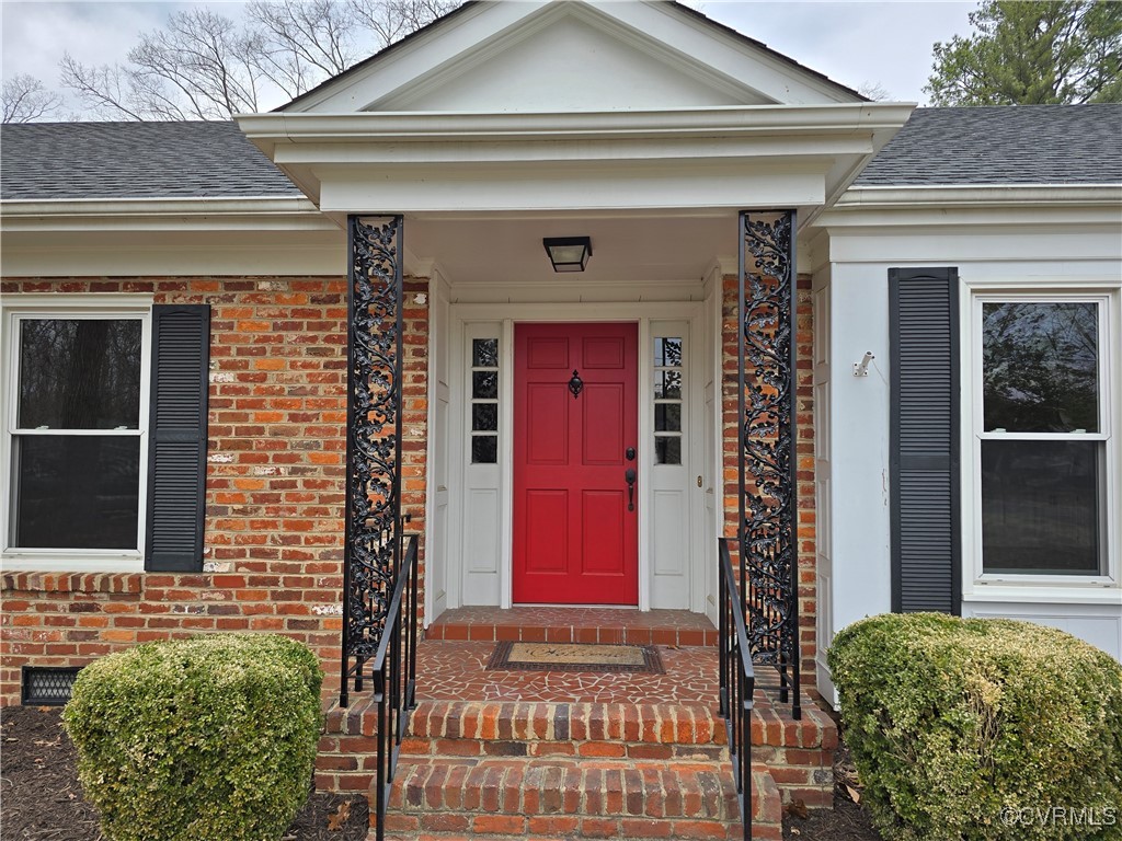 4600 Bruce Road Chester, VA 23831 - Photo 13 of 44 a front view of a house with a red gate