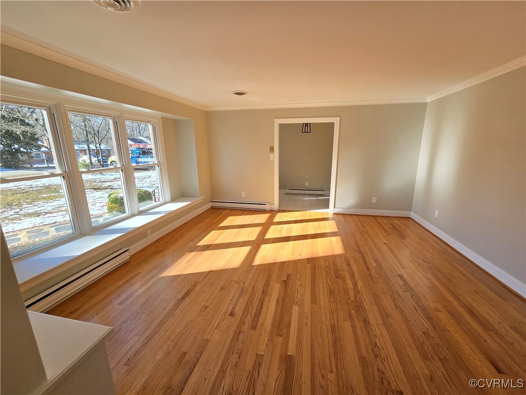 4600 Bruce Road Chester, VA 23831 - Photo 18 of 44 a view of an empty room with wooden floor and a window