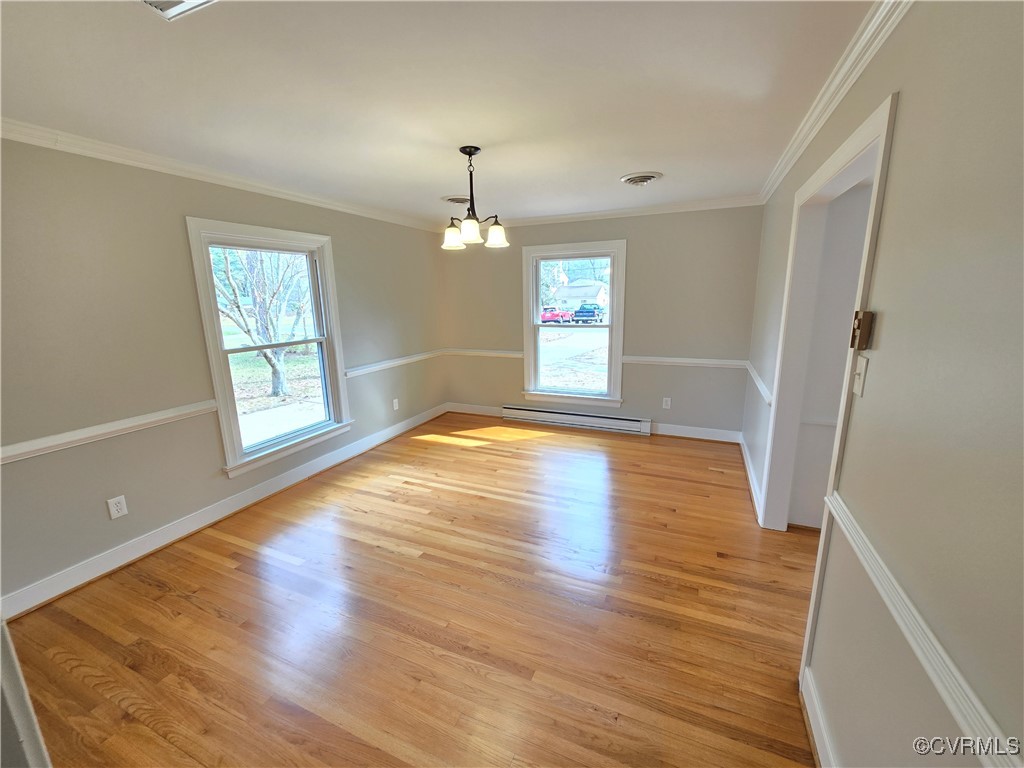 4600 Bruce Road Chester, VA 23831 - Photo 19 of 44 an empty room with wooden floor and windows