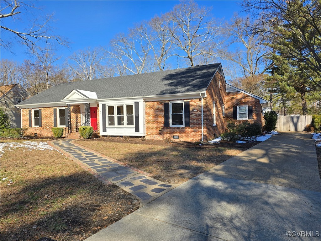 4600 Bruce Road Chester, VA 23831 - Photo 3 of 44 a front view of a house with a road