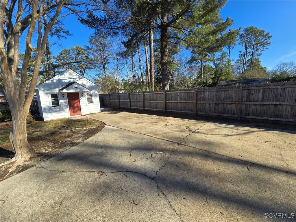 4600 Bruce Road Chester, VA 23831 - Photo 10 of 44 a view of backyard with wooden fence