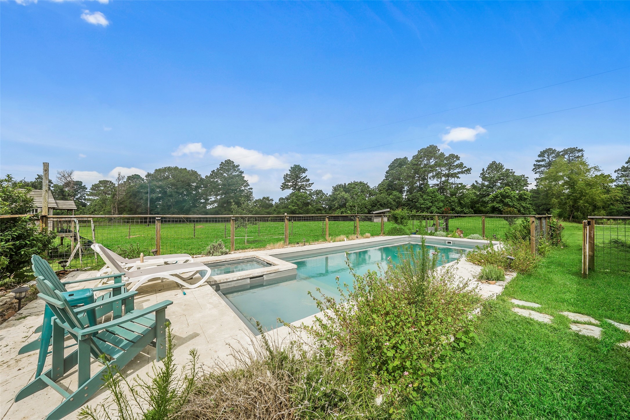 26534 Mitchell Road Hempstead, TX 77445 - Photo 37 of 45 a view of lake with house in background