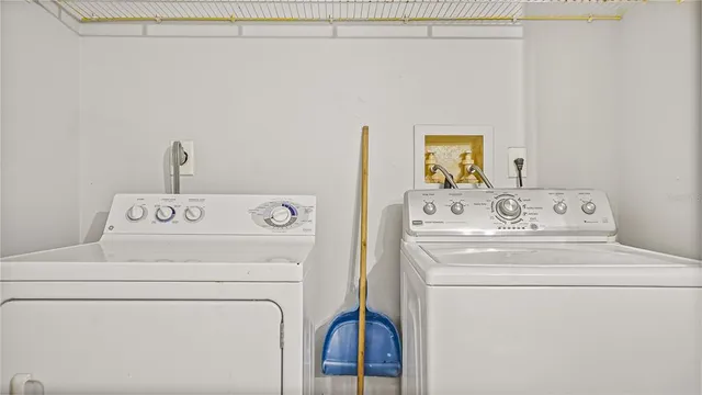 a utility room with dryer and washer