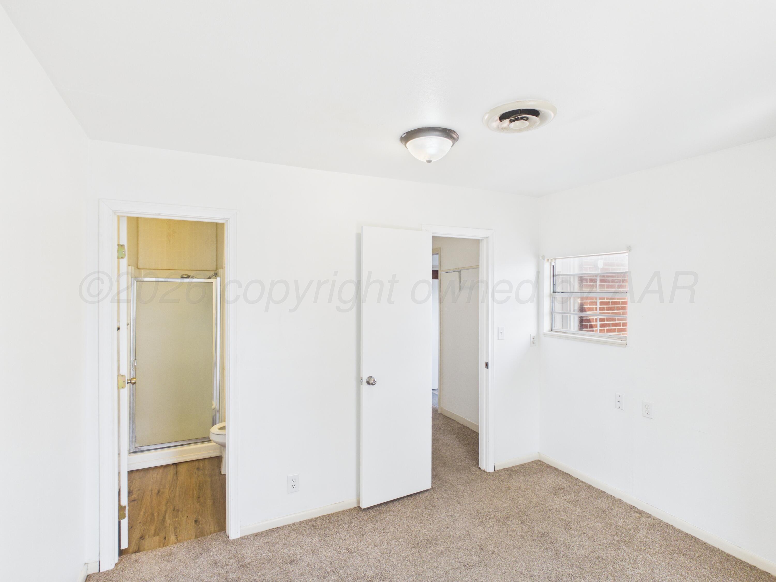 813 Northeast 3rd Street Dumas, TX 79029 - Photo 19 of 22 a view of an empty room