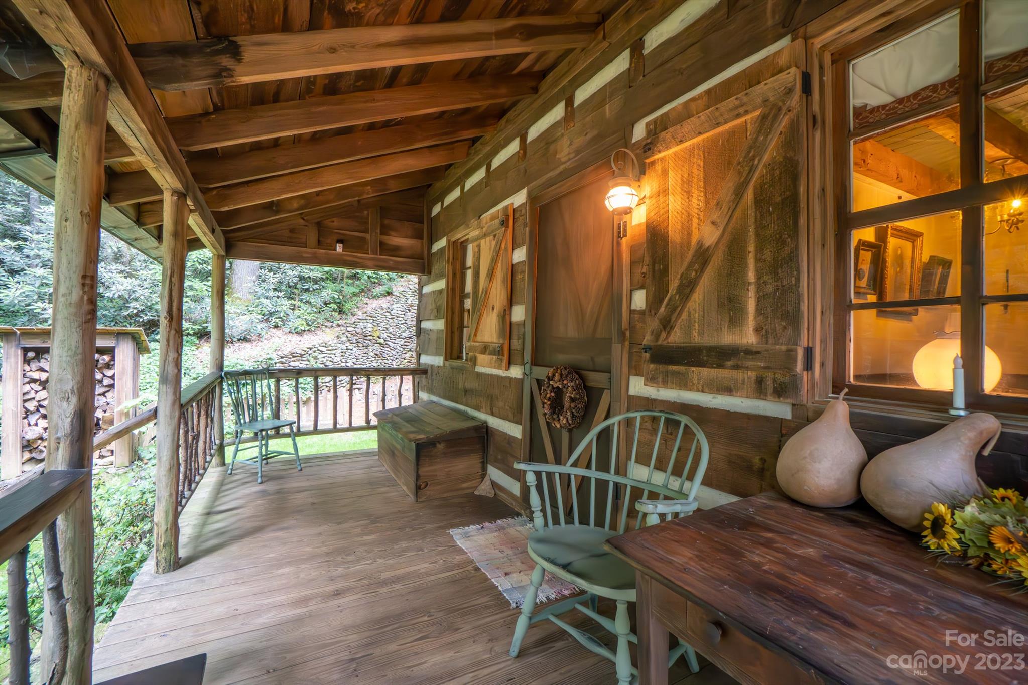 5646 Highway 18 Morganton, NC 28655 - Photo 11 of 37 a living room with furniture and floor to ceiling windows