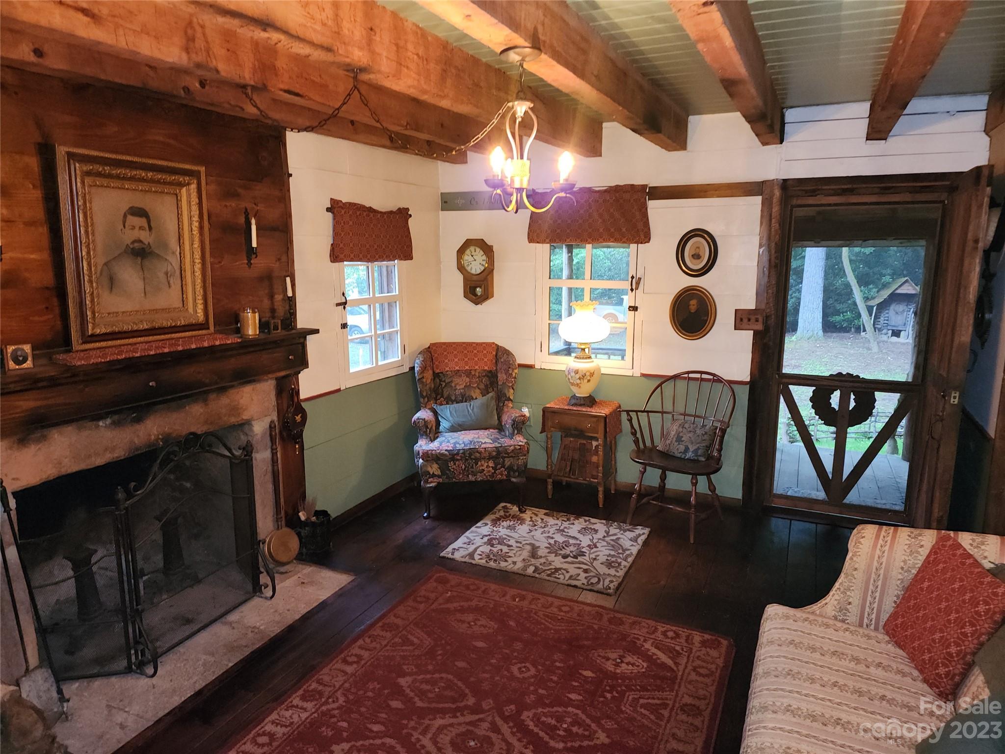 5646 Highway 18 Morganton, NC 28655 - Photo 12 of 37 a living room with furniture and a fireplace