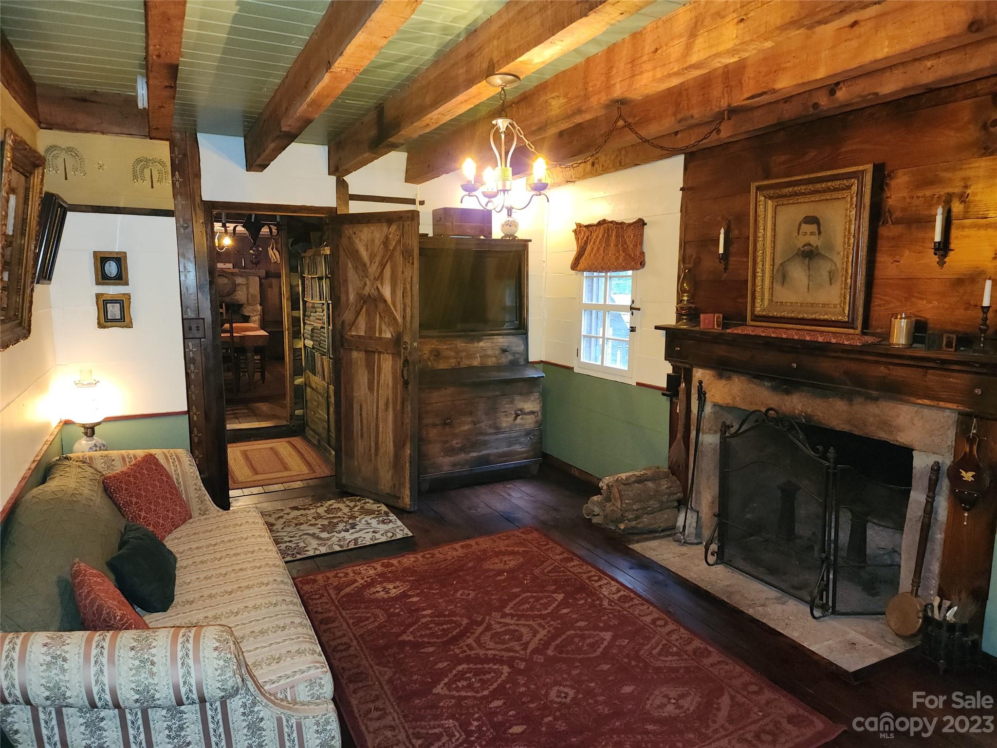 5646 Highway 18 Morganton, NC 28655 - Photo 19 of 37 a living room with furniture and a fireplace