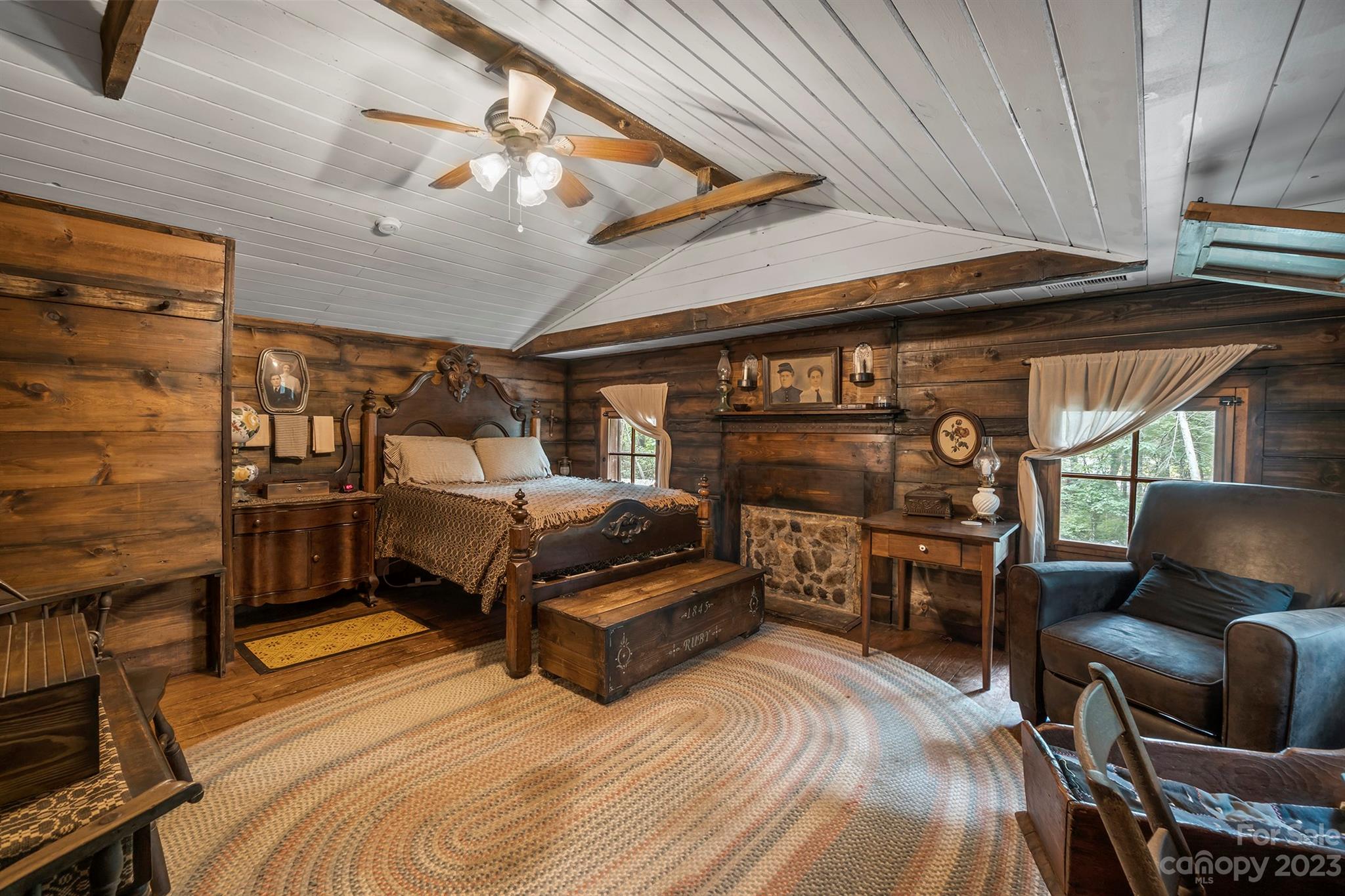 5646 Highway 18 Morganton, NC 28655 - Photo 24 of 37 a bedroom with furniture and wooden floor