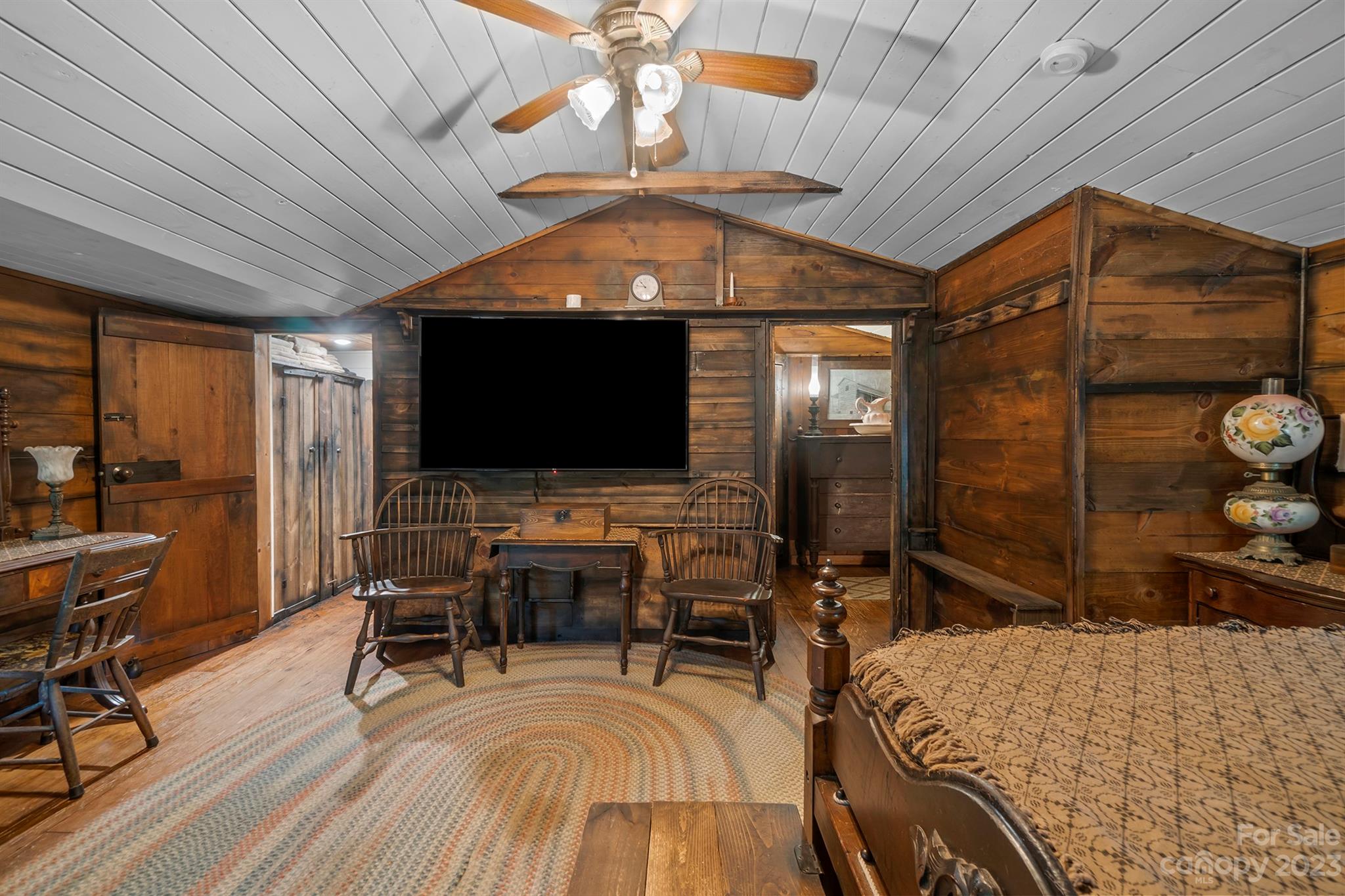 5646 Highway 18 Morganton, NC 28655 - Photo 26 of 37 a bedroom with furniture and a flat screen tv