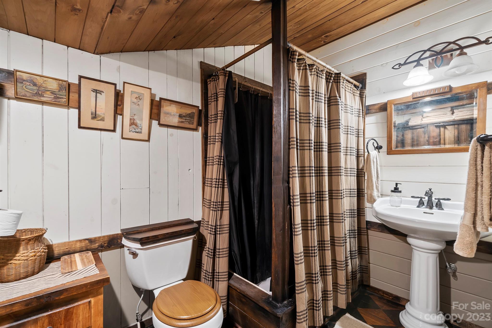 5646 Highway 18 Morganton, NC 28655 - Photo 27 of 37 a bathroom with a sink toilet and shower