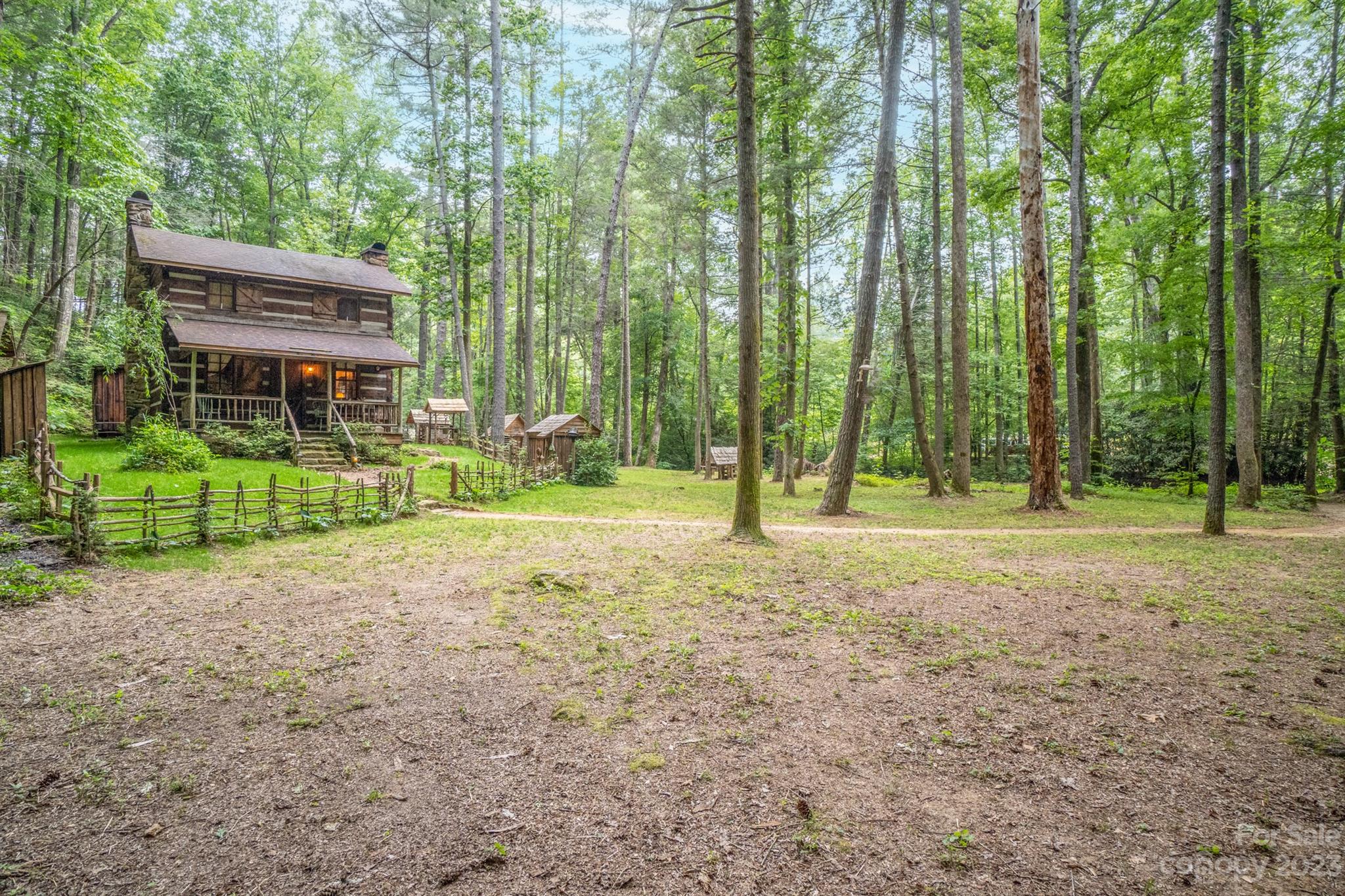 5646 Highway 18 Morganton, NC 28655 - Photo 7 of 37 a backyard of a house with lots of green space and fountain