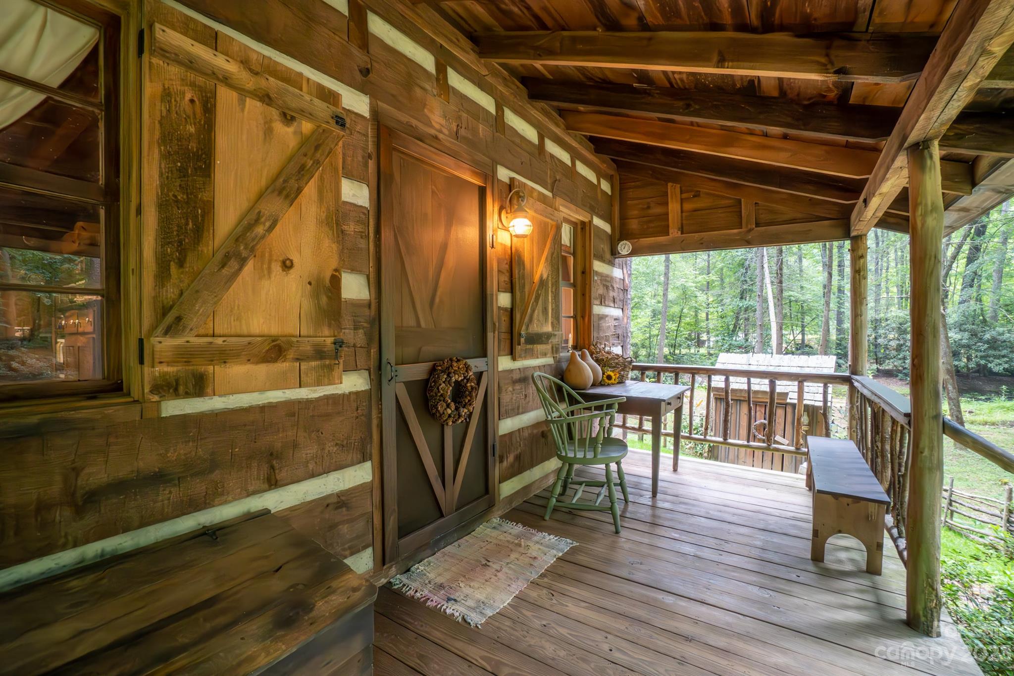 5646 Highway 18 Morganton, NC 28655 - Photo 10 of 37 a view of a porch with wooden floor