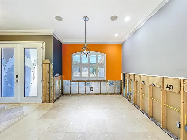 a kitchen with stainless steel appliances kitchen island granite countertop a refrigerator and a stove