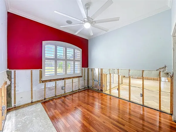 a view of a house with swimming pool and porch