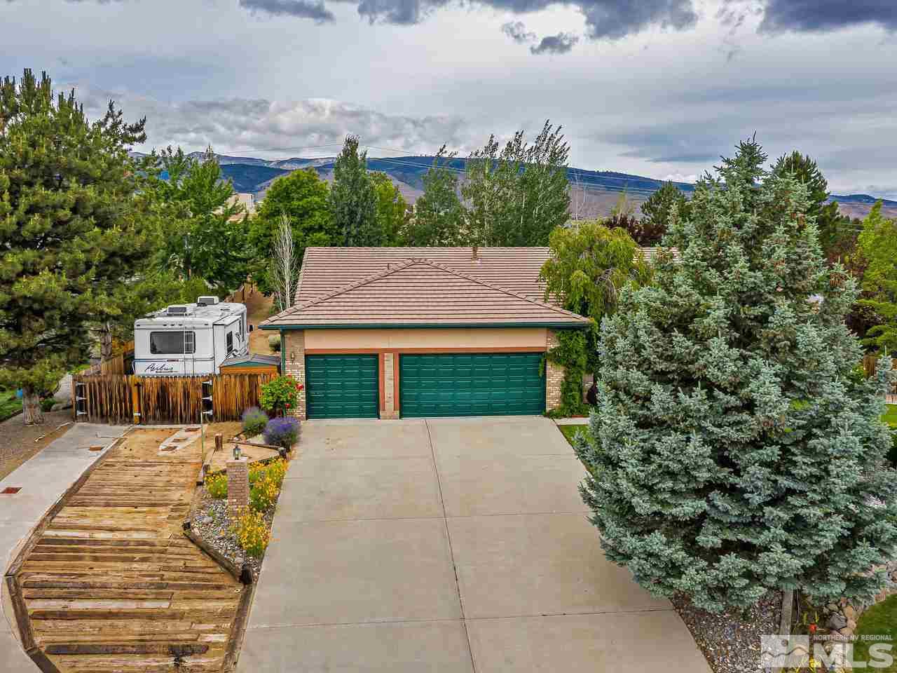 35 Calla Lily Court Reno, NV 89511 - Photo 30 of 39 front view of a house with a yard