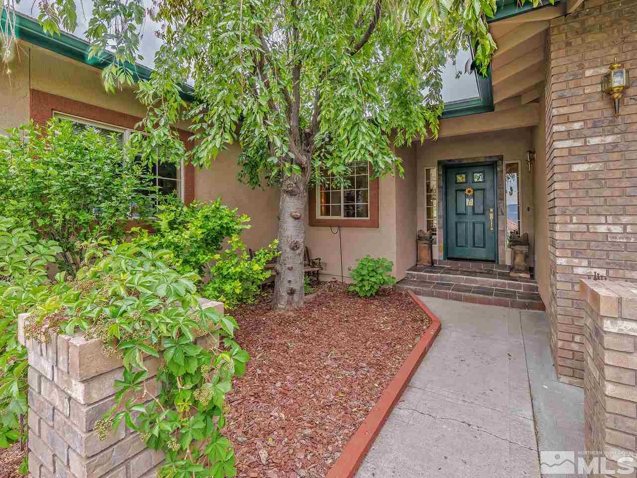 35 Calla Lily Court Reno, NV 89511 - Photo 3 of 39 front view of a house with a yard