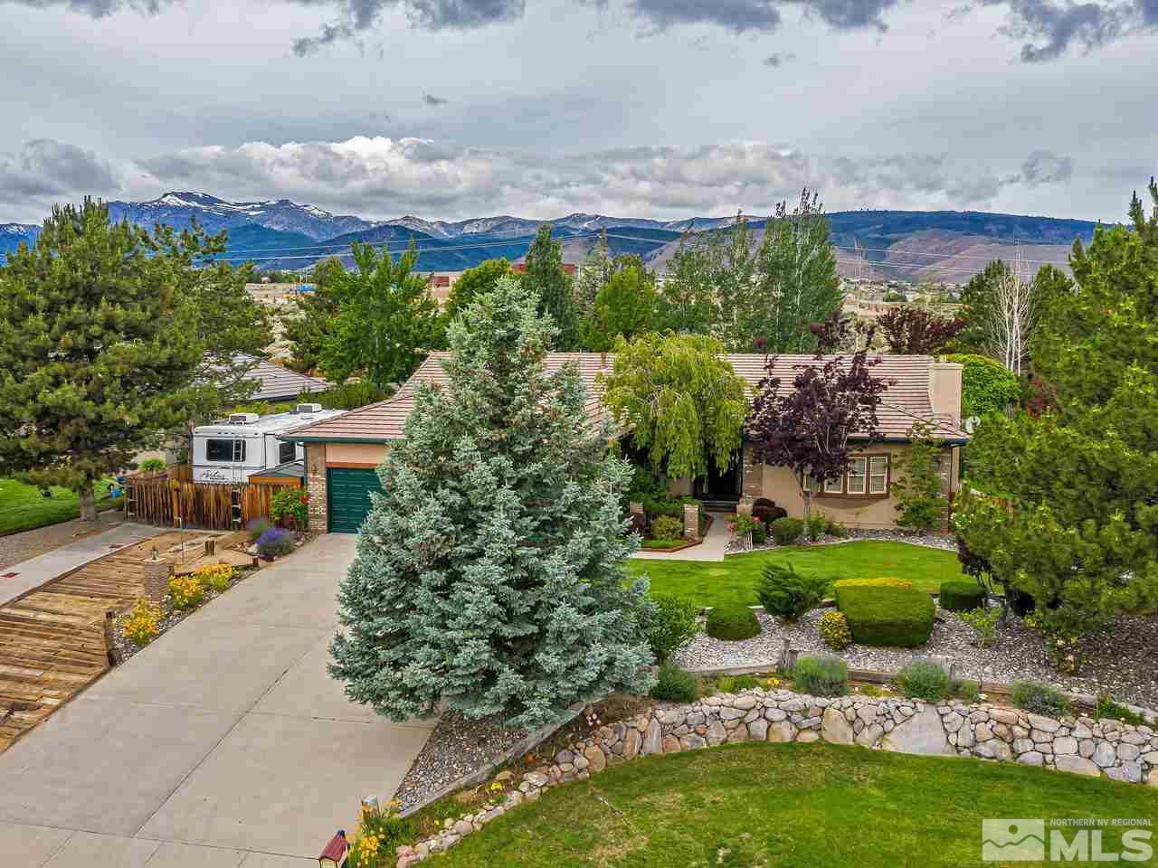 35 Calla Lily Court Reno, NV 89511 - Photo 31 of 39 an aerial view of a house with a yard basket ball court and outdoor seating