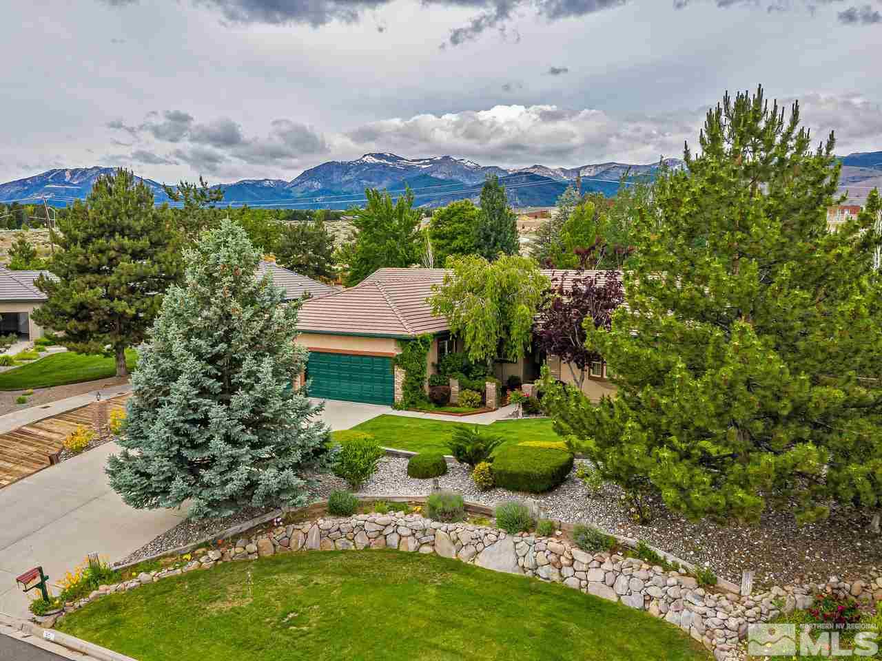 35 Calla Lily Court Reno, NV 89511 - Photo 32 of 39 a view of a garden with a building in the background