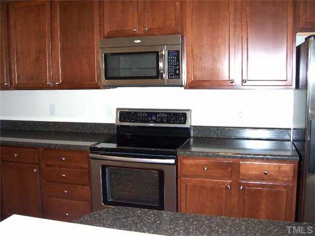 3002 Berkeley Street Raleigh, NC 27612 - Photo 2 of 10 Example of Upgraded Appliance, Mapel Cabinets and countertops. Spacious Kitchen with plenty work space plus a pantry!