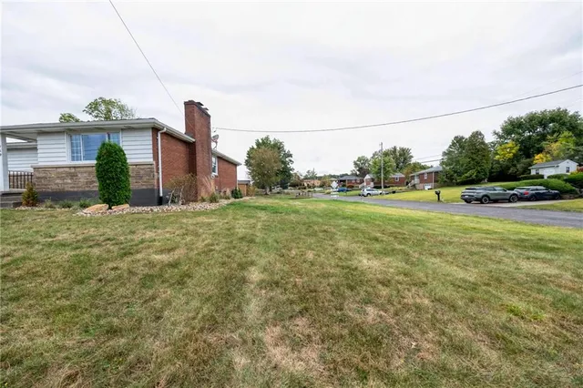 a view of a street with houses