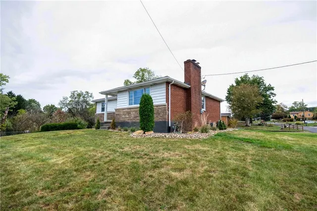 a house view with a garden space