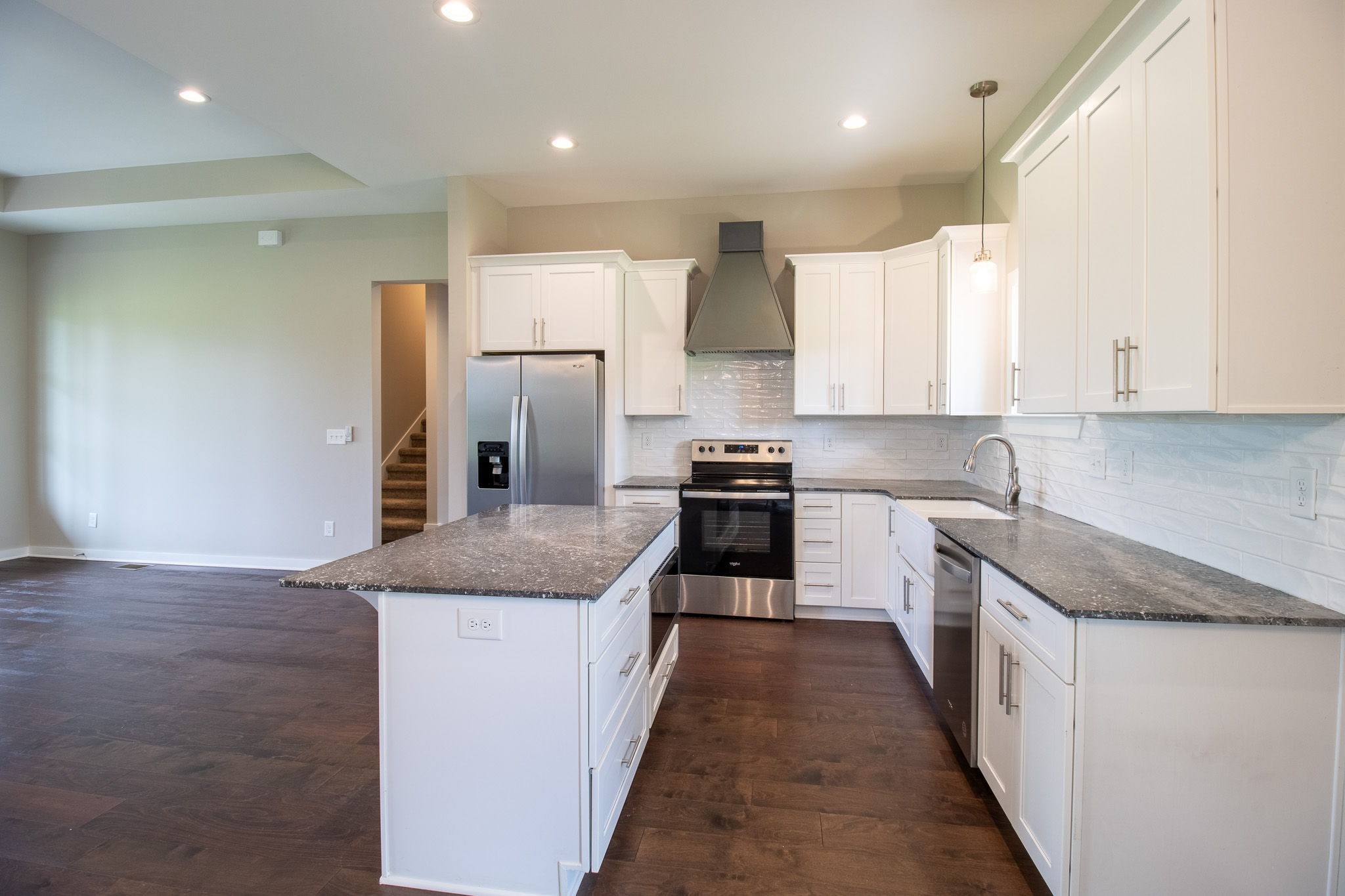 264 Dink Rut Road Portland, TN 37148 - Photo 24 of 56 a kitchen with stainless steel appliances granite countertop a sink stove and refrigerator