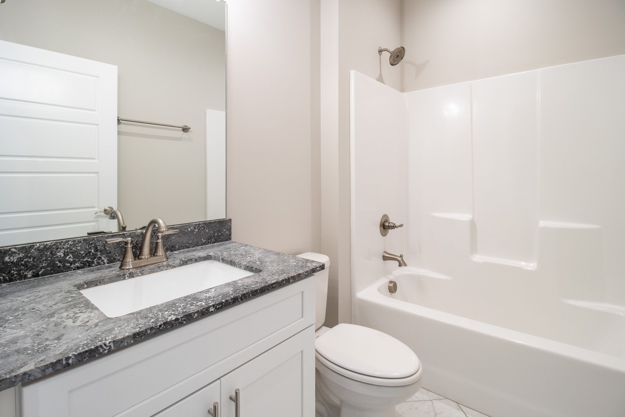 264 Dink Rut Road Portland, TN 37148 - Photo 38 of 56 a bathroom with a granite countertop sink toilet and shower