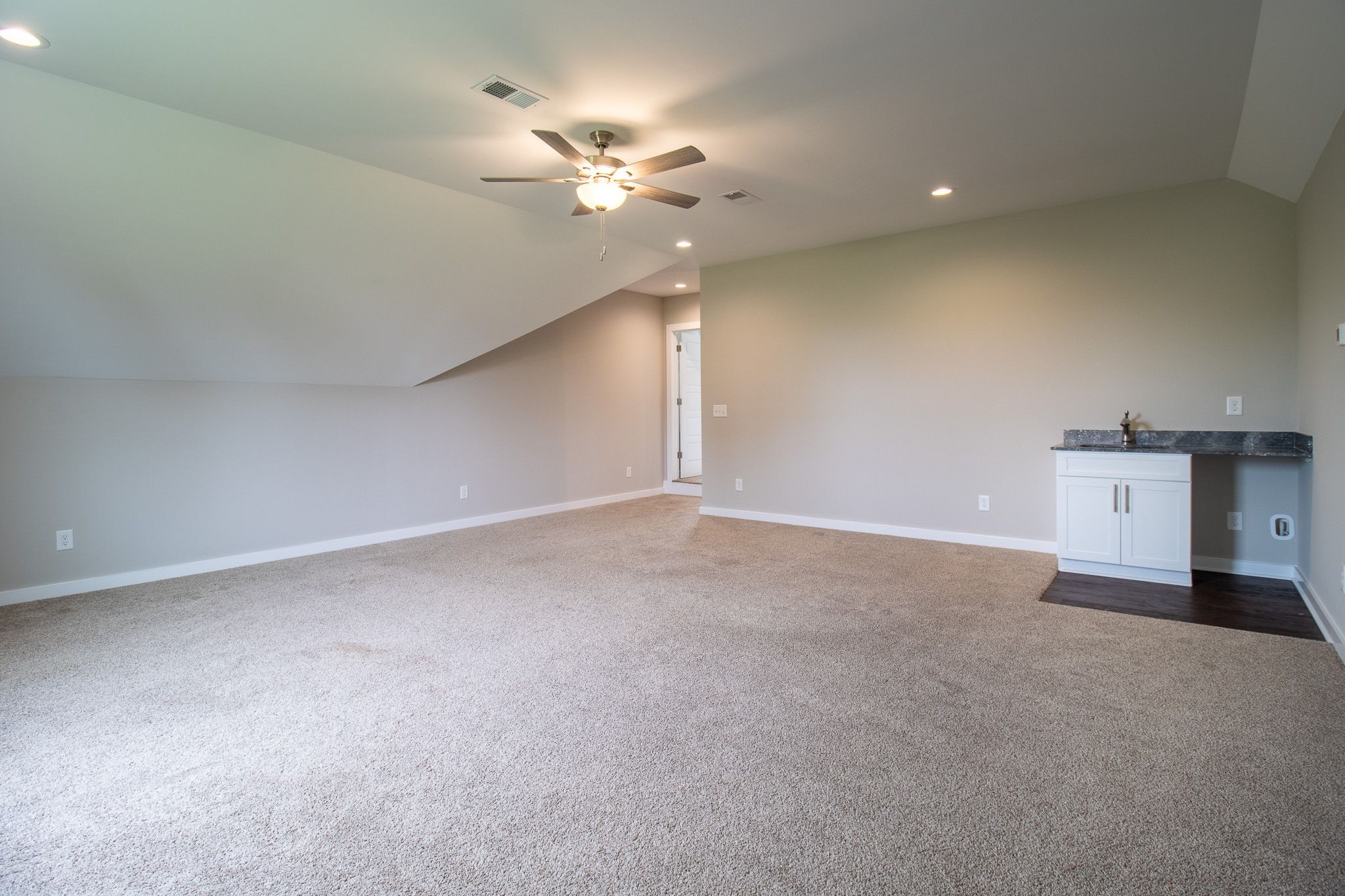 264 Dink Rut Road Portland, TN 37148 - Photo 42 of 56 a view of an empty room with a chandelier fan